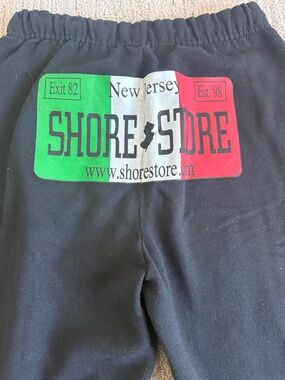 Gildan Black Track Pants with Green White Red Shore Store Logo